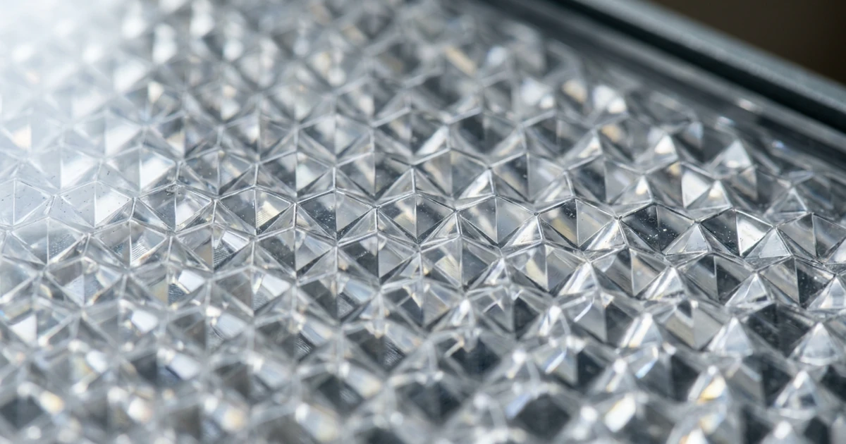 Micro-prismatic optical diffuser structure for LED luminaires